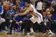 Feb 9, 2014; Oklahoma City, OK, USA; New York Knicks point guard Raymond Felton (2) dribbles the ball as Oklahoma City Thunder shooting guard Thabo Sefolosha (25) defends during the fourth quarterat Chesapeake Energy Arena. Mandatory Credit: Mark D. Smit