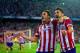 MADRID, SPAIN - APRIL 09: Koke of Club Atletico de Madrid celebrates scoring the opening goal with David Villa of Club Atletico de Madrid during the UEFA Champions League Quarter Final second leg match between Club Atletico de Madrid and FC Barcelona at