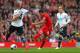 LIVERPOOL, ENGLAND - MARCH 30: Philippe Coutinho of Liverpool scores the third goal during the Barclays Premier League match between Liverpool and Tottenham Hotspur at Anfield on March 30, 2014 in Liverpool, England. (Photo by Alex Livesey/Getty Images