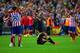 MADRID, SPAIN - APRIL 09: A dejected Marc Bartra of Barcelona sits on the pitch after defeat during the UEFA Champions League Quarter Final second leg match between Club Atletico de Madrid and FC Barcelona at Vicente Calderon Stadium on April 9, 2014 in M