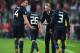 MUNICH, GERMANY - APRIL 09: David Moyes, manager of Manchester United talks to Phil Jones and Shinji Kagawa of Manchester United after the goal scored by Patrice Evra during the UEFA Champions League Quarter Final second leg match between FC Bayern Muench