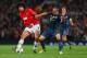 MANCHESTER, ENGLAND - APRIL 01: Marouane Fellaini of Manchester United and Franck Ribery of Bayern Muenchen battle for the ball during the UEFA Champions League Quarter Final first leg match between Manchester United and FC Bayern Muenchen at Old Traffor