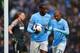 MANCHESTER, ENGLAND - MARCH 22: Yaya Toure of Manchester City celebrates scoring their second goal with Fernandinho of Manchester City during the Barclays Premier League match between Manchester City and Fulham at Etihad Stadium on March 22, 2014 in Manc