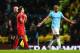 MANCHESTER, ENGLAND - DECEMBER 26: Luis Suarez of Liverpool talks to Vincent Kompany of Manchester City as they walk off for half time during the Barclays Premier League match between Manchester City and Liverpool at Etihad Stadium on December 26, 2013 i