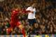 LONDON, ENGLAND - DECEMBER 15: Lucas Leiva of Liverpool marshalls Mousa Dembele of Tottenham Hotspur during the Barclays Premier League match between Tottenham Hotspur and Liverpool at White Hart Lane on December 15, 2013 in London, England. (Photo by P