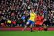 LIVERPOOL, ENGLAND - FEBRUARY 08: Daniel Sturridge of Liverpool scores the fourth goal during the Barclays Premier League match between Liverpool and Arsenal at Anfield on February 8, 2014 in Liverpool, England. (Photo by Michael Regan/Getty Images)
