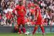 LIVERPOOL, ENGLAND - MARCH 30: Luis Suarez (R) and Daniel Sturridge of Liverpool prepare to kick off during the Barclays Premier League match between Liverpool and Tottenham Hotspur at Anfield on March 30, 2014 in Liverpool, England. (Photo by Alex Live