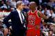 CHICAGO - JUNE 16: Michael Jordan #23 of the Chicago Bulls discusses strategy with head coach Phil Jackson in Game Six of the 1996 NBA Finals against the Seattle SuperSonics at the United Center on June 16, 1996 in Chicago Iillinois. The Bulls won 87-75