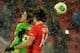 MOSCOW, RUSSIA - DECEMBER 07: Vedran Corluka (R) of FC Lokomotiv Moscow is challenged by Sardar Azmoun of FC Rubin Kazan during the Russian Premier League match between FC Lokomotiv Moscow and FC Rubin Kazan at Lokomotiv Stadium on December 07, 2013 in Mo