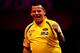 LONDON, ENGLAND - DECEMBER 15: Dave Chisnall of England celebrates after winning a leg during day three of the Ladbrokes.com World Darts Championships at Alexandra Palace on December 15, 2013 in London, England. (Photo by Ben Hoskins/Getty Images)