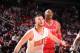 HOUSTON, TX - FEBRUARY 5: Dwight Howard #12 of the Houston Rockets and Miles Plumlee #22 of the Phoenix Suns battle for the rebound on February 5, 2014 at the Toyota Center in Houston, Texas. NOTE TO USER: User expressly acknowledges and agrees that, by