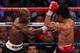 LAS VEGAS, NV - JUNE 09: (L-R) Timothy Bradley lands a right to the head of Manny Pacquiao during their WBO welterweight title fight at MGM Grand Garden Arena on June 9, 2012 in Las Vegas, Nevada. (Photo by Jeff Bottari/Getty Images)
