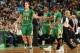 BOSTON, MA - MARCH 14: Kelly Olynyk #41 and Rajon Rondo #9 of the Boston Celtics celebrate during the game against the Phoenix Suns on March 14, 2014 at the TD Garden in Boston, Massachusetts. NOTE TO USER: User expressly acknowledges and agrees that, by