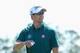 AUGUSTA, GA - APRIL 10: Adam Scott of Australia saves par on the 18th green during the first round of the 2014 Masters Tournament at Augusta National Golf Club on April 10, 2014 in Augusta, Georgia. (Photo by Andrew Redington/Getty Images)