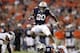 Sep 14, 2013; Auburn, AL, USA; Auburn Tigers running back Corey Grant (20) leaps over fullback Jay Prosch (35) during the first half against the Mississippi State Bulldogs at Jordan Hare Stadium. Mandatory Credit: John Reed-USA TODAY Sports