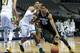 DALLAS, TX - NOVEMBER 8: Spencer Dinwiddie #25 of the Colorado Buffaloes drives to the basket against Ish Wainright #24 of the Baylor Bears during the Tip-Off Showcase on November 8, 2013 at the American Airlines Center in Dallas, Texas. (Photo by Coope