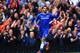 LONDON, ENGLAND - MARCH 22: Mohamed Salah of Chelsea celebrates scoring their sixth goal uring the Barclays Premier League match between Chelsea and Arsenal at Stamford Bridge on March 22, 2014 in London, England. (Photo by Richard Heathcote/Getty Image