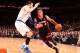 NEW YORK, NY - JANUARY 9: Michael Beasley #8 of the Miami Heat drives to the basket against Andrea Bargnani #77 of the New York Knicks during a game at Madison Square Garden in New York City on January 9, 2014. NOTE TO USER: User expressly acknowledges a
