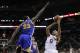 Apr 2, 2014; San Antonio, TX, USA; San Antonio Spurs guard Tony Parker (9) shoots the ball over Golden State Warriors forward Draymond Green (23) during the second half at AT&T Center. The Spurs won 111-90. Mandatory Credit: Soobum Im-USA TODAY Sports