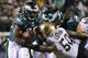 PHILADELPHIA, PA - JANUARY 04: LeSean McCoy #25 of the Philadelphia Eagles completes a forth and one play in the end of the first quarter against Curtis Lofton #50 of the New Orleans Saints during their NFC Wild Card Playoff game at Lincoln Financial Fi