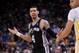 Mar 22, 2014; Oakland, CA, USA; San Antonio Spurs guard Danny Green (4) reacts after making a three point basket against the Golden State Warriors in the fourth quarter at Oracle Arena. The Spurs defeated the Warriors 99-90. Mandatory Credit: Cary Edmonds