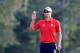 AUGUSTA, GA - APRIL 11: Adam Scott of Australia waves on the 18th hole during the second round of the 2014 Masters Tournament at Augusta National Golf Club on April 11, 2014 in Augusta, Georgia. (Photo by Rob Carr/Getty Images)