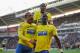 HULL, ENGLAND - MARCH 01: Moussa Sissoko (R) of Newcastle United celebrates with Loic Remy after scoring their third goal during the Barclays Premier League match between Hull City and Newcastle United at KC Stadium on March 1, 2014 in Hull, England. (P