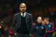 MANCHESTER, ENGLAND - APRIL 01: Pep Guardiola head coach of Bayern Muenchen at the end of match during the UEFA Champions League Quarter Final first leg match between Manchester United and FC Bayern Muenchen at Old Trafford on April 1, 2014 in Manchester