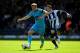 WEST BROMWICH, ENGLAND - APRIL 12: Harry Kane of Spurs is pursued by Morgan Amalfitano of West Bromwich during the Barclays Premier League match between West Bromwich Albion and Tottenham Hotspur at The Hawthorns on April 12, 2014 in West Bromwich, Engla