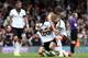 LONDON, ENGLAND - APRIL 12: Hugo Rodallega of Fulham celebrates the teams win with Lewis Holtby and Pajtim Kasami at the final whistle during the Barclays Premier League match between Fulham and Norwich City at Craven Cottage on April 12, 2014 in London,