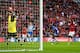 LONDON, ENGLAND - APRIL 12: Scott Carson of Wigan Athletic makes a save from Yaya Sanogo of Arsenal during the FA Cup Semi-Final match between Wigan Athletic and Arsenal at Wembley Stadium on April 12, 2014 in London, England. (Photo by Michael Steele/G