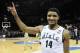 Mar 22, 2014; Spokane, WA, USA; Michigan State Spartans guard Gary Harris (14) celebrates after a men's college basketball game during the third round of the 2014 NCAA Tournament against the Harvard Crimson at Veterans Memorial Arena. The Spartans defeate