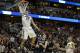 Mar 27, 2014; Anaheim, CA, USA; Arizona Wildcats forward Aaron Gordon (11) dunks the ball past San Diego State Aztecs forward Matt Shrigley (40) during the second half in the semifinals of the west regional of the 2014 NCAA Mens Basketball Championship to