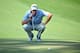 AUGUSTA, GA - APRIL 12: Jim Furyk of the United States lines up a putt on the tenth green during the third round of the 2014 Masters Tournament at Augusta National Golf Club on April 12, 2014 in Augusta, Georgia. (Photo by Andrew Redington/Getty Images)