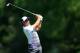 AUGUSTA, GA - APRIL 12: Rickie Fowler of the United States hits his tee shot on the 12th hole during the third round of the 2014 Masters Tournament at Augusta National Golf Club on April 12, 2014 in Augusta, Georgia. (Photo by David Cannon/Getty Images)