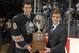 WASHINGTON - OCTOBER 14: Washington Capitals' Alex Ovechkin #8 receives the Calder Trophy from VP and General Manager of the Washington Capitals, George McPhee, before a hockey game against the Atlanta Thrashers at the Verizon Center October 14, 2006 in