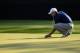 Apr 12, 2014; Augusta, GA, USA; Jordan Spieth places his ball on the 15th green during the third round of the 2014 The Masters golf tournament at Augusta National Golf Club. Mandatory Credit: Michael Madrid-USA TODAY Sports