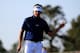 AUGUSTA, GA - APRIL 12: Bubba Watson of the United States waves on the 17th green during the third round of the 2014 Masters Tournament at Augusta National Golf Club on April 12, 2014 in Augusta, Georgia. (Photo by Rob Carr/Getty Images)
