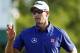 Adam Scott is trying to defend his Masters championship.
