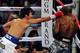 LAS VEGAS, NV - APRIL 12: Manny Pacquiao (L) and Timothy Bradley fight during their WBO world welterweight championship boxing match at the MGM Grand Garden Arena on April 12, 2014 in Las Vegas, Nevada. (Photo by David Becker/Getty Images)