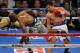 LAS VEGAS, NV - APRIL 12: Timothy Bradley (L) and Manny Pacquiao battle it out during their WBO world welterweight championship boxing match at the MGM Grand Garden Arena on April 12, 2014 in Las Vegas, Nevada. Pacquiao won by unanimous decision. (Photo