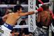 LAS VEGAS, NV - APRIL 12: Manny Pacquiao (L) and Timothy Bradley fight during their WBO world welterweight championship boxing match at the MGM Grand Garden Arena on April 12, 2014 in Las Vegas, Nevada. (Photo by David Becker/Getty Images)