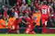 LIVERPOOL, ENGLAND - APRIL 13: Martin Skrtel of Liverpool celebrates scoring the second goal with team-mate Steven Gerrard (L) during the Barclays Premier League match between Liverpool and Manchester City at Anfield on April 13, 2014 in Liverpool, Engla