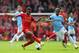 LIVERPOOL, ENGLAND - APRIL 13: Raheem Sterling of Liverpool competes with Fernandinho of Manchester City during the Barclays Premier League match between Liverpool and Manchester City at Anfield on April 13, 2014 in Liverpool, England. (Photo by Alex Li