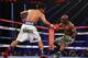 LAS VEGAS, NV - APRIL 12: Manny Pacquiao catches Timothy Bradley off balance at the MGM Grand Garden Arena on April 12, 2014 in Las Vegas, Nevada. (Photo by Jeff Gross/Getty Images)