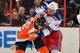 PHILADELPHIA, PA - OCTOBER 24: Zac Rinaldo #36 of the Philadelphia Flyers and Derek Dorsett #15 of the New York Rangers fight in the first period at the Wells Fargo Center on October 24, 2013 in Philadelphia, Pennsylvania. (Photo by Drew Hallowell/Getty