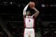 AUBURN HILLS, MI - APRIL 5: Josh Smith #6 of the Detroit Pistons shoots against the Boston Celtics on April 5, 2014 at The Palace of Auburn Hills in Auburn Hills, Michigan. NOTE TO USER: User expressly acknowledges and agrees that, by downloading and/or u