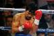 LAS VEGAS, NV - APRIL 12: Manny Pacquiao (L) and Timothy Bradley fight during their WBO world welterweight championship boxing match at the MGM Grand Garden Arena on April 12, 2014 in Las Vegas, Nevada. (Photo by David Becker/Getty Images)
