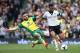 LONDON, ENGLAND - APRIL 12: Robert Snodgrass of Norwich fouls Kieran Richardson of Fulham during the Barclays Premier League match between Fulham and Norwich City at Craven Cottage on April 12, 2014 in London, England. (Photo by Charlie Crowhurst/Getty Im