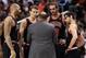 Feb 19, 2014; Toronto, Ontario, CAN; Chicago Bulls forward Carlos Boozer (5) and forward Mike Dunleavy (34) and center Joakim Noah (13) and guard Kirk Hinrich (12) listen to head coach Tom Thibodeau against the Toronto Raptors at Air Canada Centre. The Bu